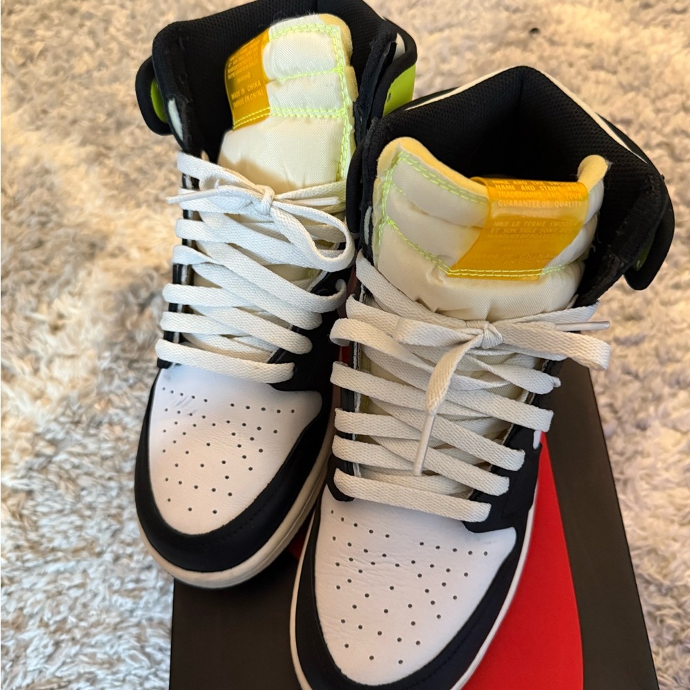 Stylish Black and White High-Top Sneakers